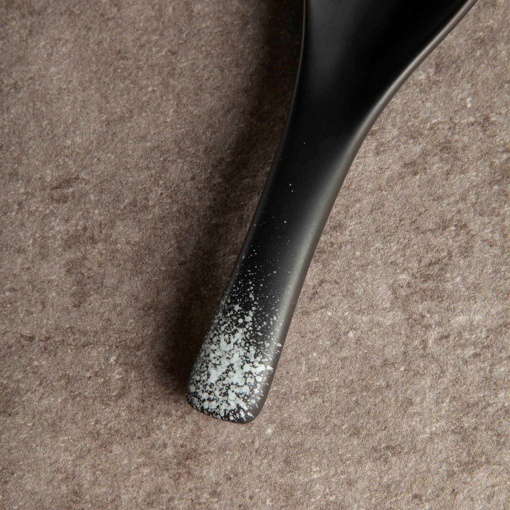 Black ceramic japanese soup spoon